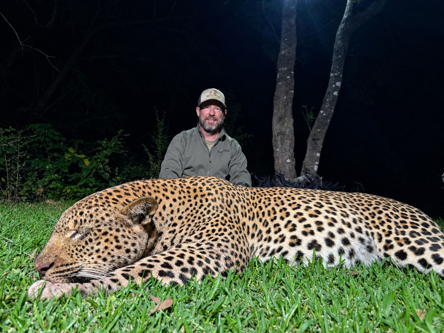 Robert Beall with a leopard