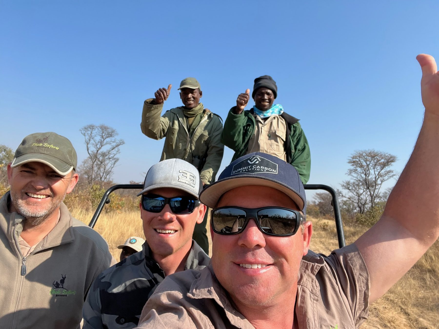 Hunting party in the safari vehicle